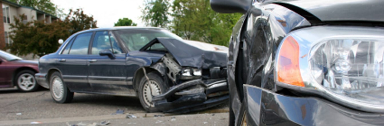 Black Car Damaged From Accident | Warner and Warner